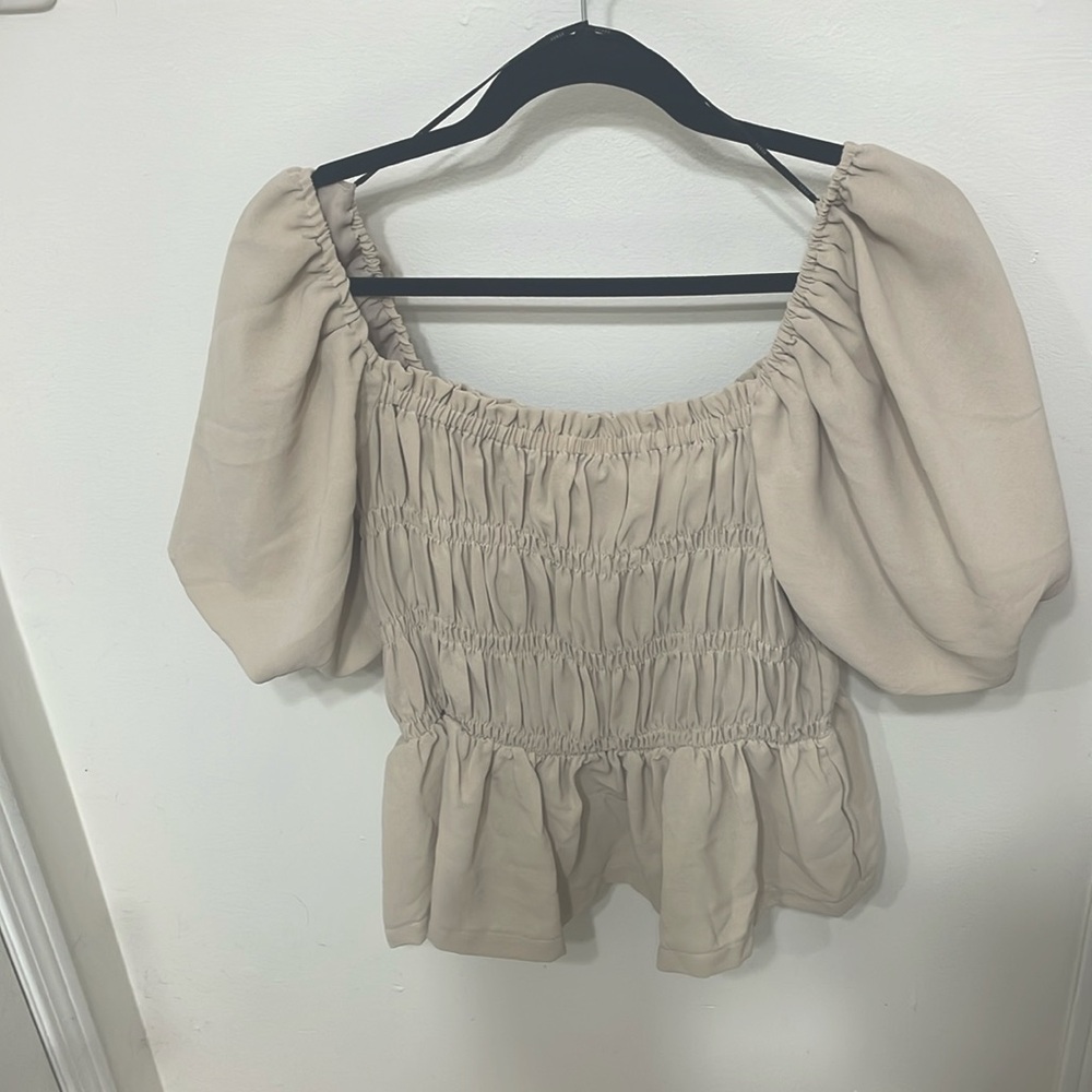 Cream blouse size US Large never worn